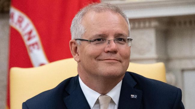 Australian Prime Minister Scott Morrison looks on during a meeting with US President Donald Trump in the Oval Office at the the White House in Washington, DC, September 20, 2019. (Photo by SAUL LOEB / AFP)