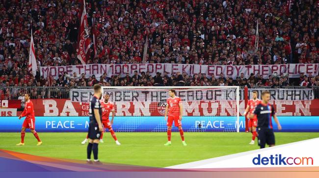 Viral portrait of Bayern Munich fans satirizing police on the Kanjuruhan tragedy