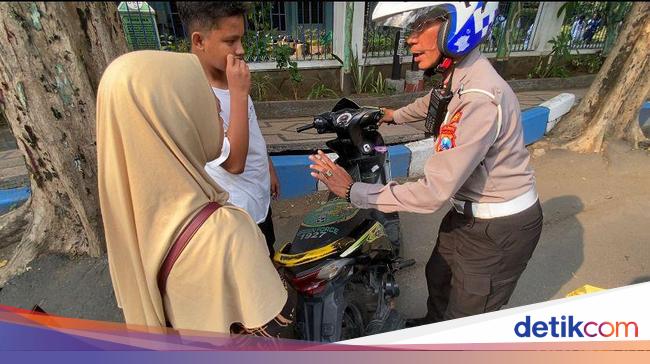 Banyak Pemotor Lepas Pelat Biar Lolos Tilang Elektronik, Ini Ancaman Hukumannya