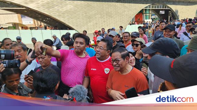 Pramono-Rano Karno Datangi CFD di Bundaran HI, Jadi Rebutan Foto Warga