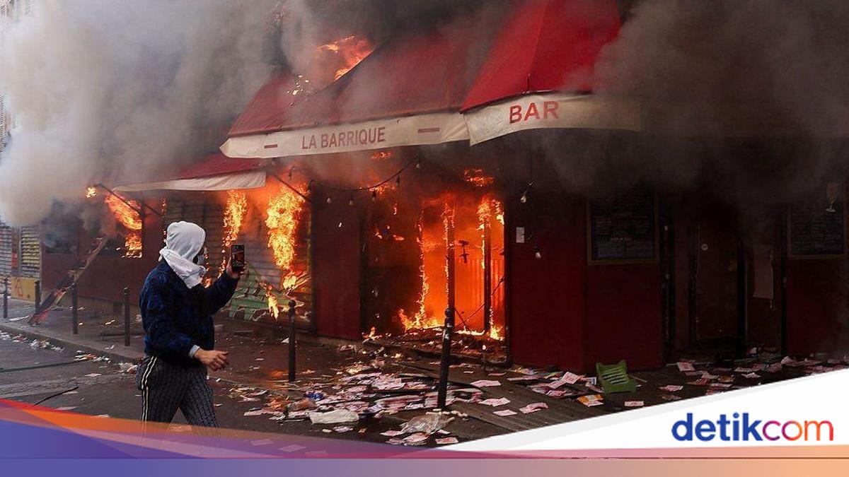 Visual editorial untuk berita: Biaya Hidup Mencekik, Prancis Membara! Pertokoan Dijarah dan Dibakar