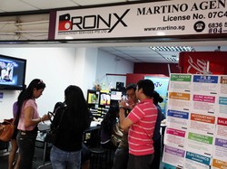 TKI di Singapura bakal Makin Mudah Kirim Uang ke RI