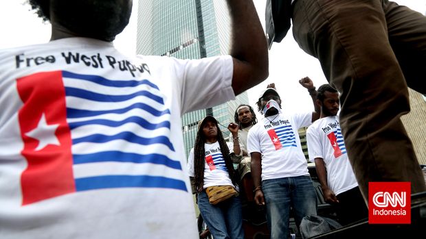 Ratusan orang dari Aliansi Mahasiswa Papua (AMP) berunjuk rasa di kawasan Bundaran HI, Jakarta, 2014.