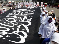 Ini Beda Bendera HTI dengan Bendera Berkalimat Tauhid