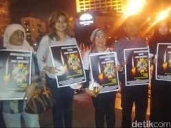 Aksi 1000 Lilin dan Tebar Bunga untuk Angeline Digelar di Bundaran HI