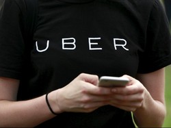 Pengadilan Tinggi Inggris Legalkan Uber Taksi