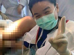 Berfoto Saat Membantu Pasien Melahirkan, Dokter Ini Tuai Kecaman