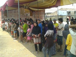 Penasaran dengan Sosok Agus Boel Tacos, Ibu-ibu Berdatangan ke Kalideres