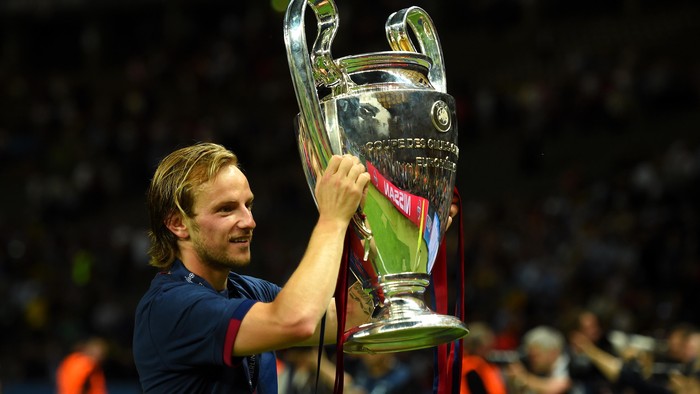 Ivan Rakitic BERLIN, GERMANY - JUNE 06: Ivan Rakitic of Barcelona holds the trophy as he celebrates victory after the UEFA Champions League Final between Juventus and FC Barcelona at Olympiastadion on June 6, 2015 in Berlin, Germany. (Photo by Shaun Botterill/Getty Images)
