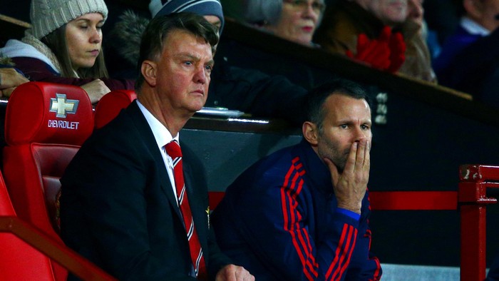MANCHESTER, ENGLAND - DECEMBER 28:  Louis van Gaal, manager of Manchester United looks on from the bench next to his assistant Ryan Giggs during the Barclays Premier League match between Manchester United and Chelsea at Old Trafford on December 28, 2015 in Manchester, England.  (Photo by Clive Mason/Getty Images)