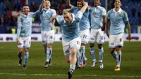 Para pemain Celta Vigo merayakan kemenangan mereka. REUTERS/Juan Medina.
