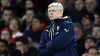 Arsene Wenger tampak serius mengamati jalannya pertandingan. Reuters/Reuters/Dylan Martinez.