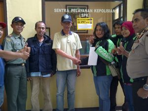 Lady GrabBike dan Opang yang Berselisih di Depan Stasiun Cawang Akhirnya Berdamai