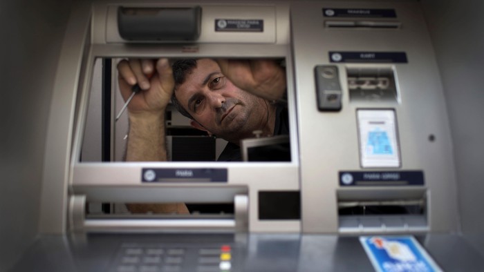 Ilustrasi mesin ATM. (Foto: Gettyimages - Uriel Sinai)