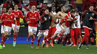 Jonas merayakan gol yang dibuatnya di menit-menit akhir pertandingan. Hugo Correia/Reuters/detikFoto.