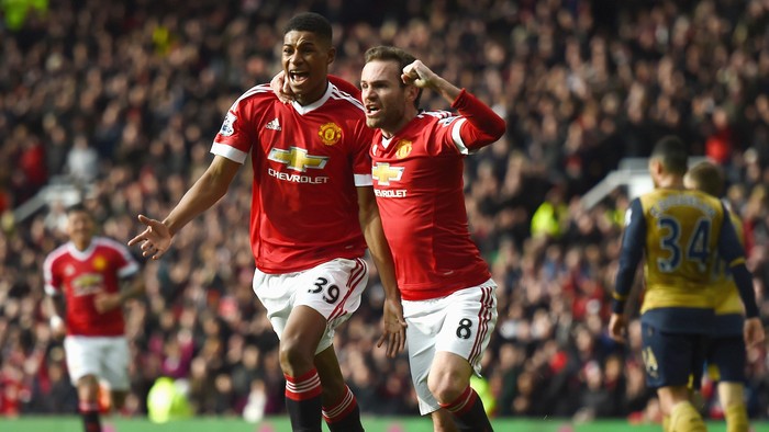 Marcus Rashford MANCHESTER, ENGLAND - FEBRUARY 28: Marcus Rashford of Manchester United celebrates scoring his opening goal with Juan Mata (R) during the Barclays Premier League match between Manchester United and Arsenal at Old Trafford on February 28, 2016 in Manchester, England. (Photo by Laurence Griffiths/Getty Images)