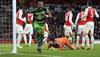 Ashley Williams merayakan gol. Dylan Martinez/Reuters/detikFoto.