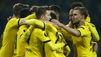 Kemenangan ini memberi Dortmund keuntungan besar untuk lolos ke perempatfinal. Tim besutan Thomas Tuchel itu cuma butuh minimal hasil imbang di leg kedua, yang digelar di markas Tottenham sepekan lagi. Reuters/Wolfgang Rattay.