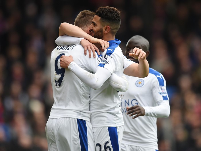 LONDON, ENGLAND - MARCH 19:  Riyad Mahrez (C) of Leicester City celebrates scoring his teams first goal with his team mate Jamie Vardy (L) during the Barclays Premier League match between Crystal Palace and Leicester City at Selhurst Park on March 19, 2016 in London, United Kingdom.  (Photo by Michael Regan/Getty Images)