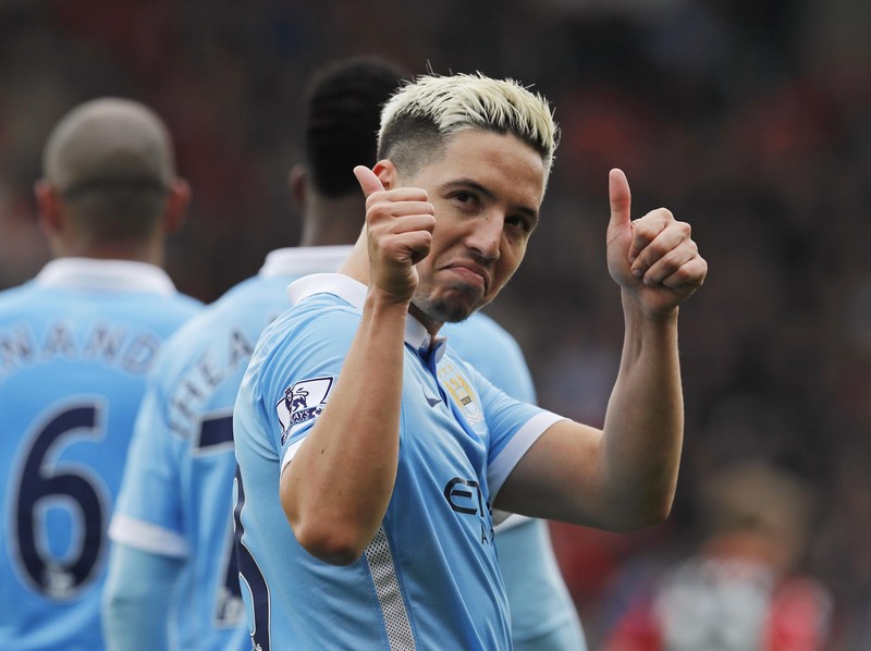Football Soccer - AFC Bournemouth v Manchester City - Barclays Premier League - Vitality Stadium - 2/4/16
Samir Nasri celebrates after Aleksandar Kolarov (not pictured) scores the fourth goal for Manchester City
Reuters / Eddie Keogh
Livepic
EDITORIAL USE ONLY. No use with unauthorized audio, video, data, fixture lists, club/league logos or 