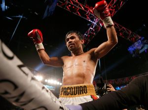 Manny Pacquiao Kalahkan Timothy Bradley