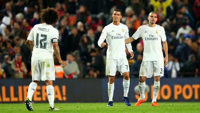   Cristiano Ronaldo of Real Madrid CF celebrates with Pepe and Marcelo of Real Madrid CF after the La Liga match between FC Barcelona and Real Madrid CF at Camp Nou on April 2, 2016 in Barcelona, Spain.  (Photo by Paul Gilham/Getty Images)