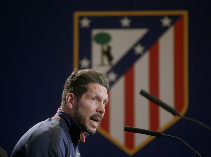 Football Soccer - Atletico Madrid training - Vicente Calderon stadium, Madrid, Spain - 12/04/16 Atletico Madrid's coach Diego Simeone attends a news conference on the eve of their UEFA Champions League match against Barcelona. REUTERS/Susana Vera
