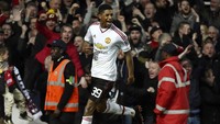 Marcus Rashford merayakan gol usai membobol gawang West Ham United. Toby Melville/Reuters/detikFoto.