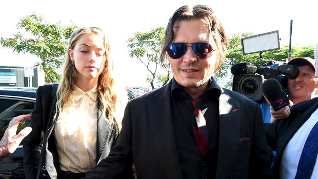 Johnny Depp dan Amber Heard mengaku sama-sama menjadi korban kekerasan.