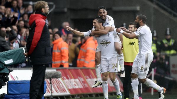Swansea Kalahkan Liverpool 3-1