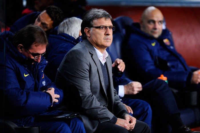 BARCELONA, SPAIN - JANUARY 26: Head coach Gerardo Tata Martino of FC Barcelona looks on from the bench during the La Liga match between FC Barcelona and Malaga CF at Camp Nou on January 26, 2014 in Barcelona, Spain. (Photo by David Ramos/Getty Images)