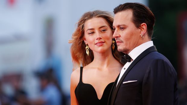 VENICE, ITALY - SEPTEMBER 04:  Johnny Depp and Amber Heard attend a premiere for 'Black Mass' during the 72nd Venice Film Festival at  on September 4, 2015 in Venice, Italy.  (Photo by Tristan Fewings/Getty Images)