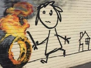 Banksy Tinggalkan Jejak di Dinding Bangunan SD Banksy Tinggalkan Jejak di Dinding Bangunan SD