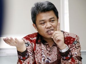 Grab Beli Uber Belum Lapor KPPU, Terancam Denda Rp 1 Miliar/Hari