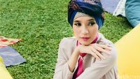 Dhini Aminarti