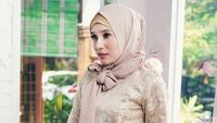 Dhini Aminarti