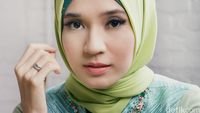 Dhini Aminarti