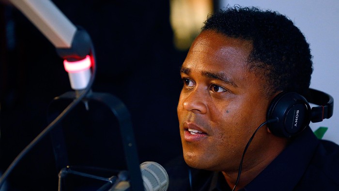 Patrick Kluivert DALLAS, TX - APRIL 17: Curacao national football team coach Patrick Kluivert is interviewed by KTCK 1310 The Ticket radio station as he promotes the 2015 UEFA Champions League Trophy Tour presented by Heineken on April 17, 2015 in Dallas, Texas. (Photo by Mike Stone/Getty Images)