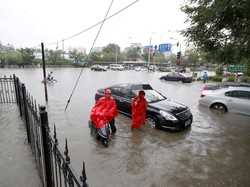Hujan Deras Picu Kekacauan di Beijing, 200 Penerbangan Dibatalkan