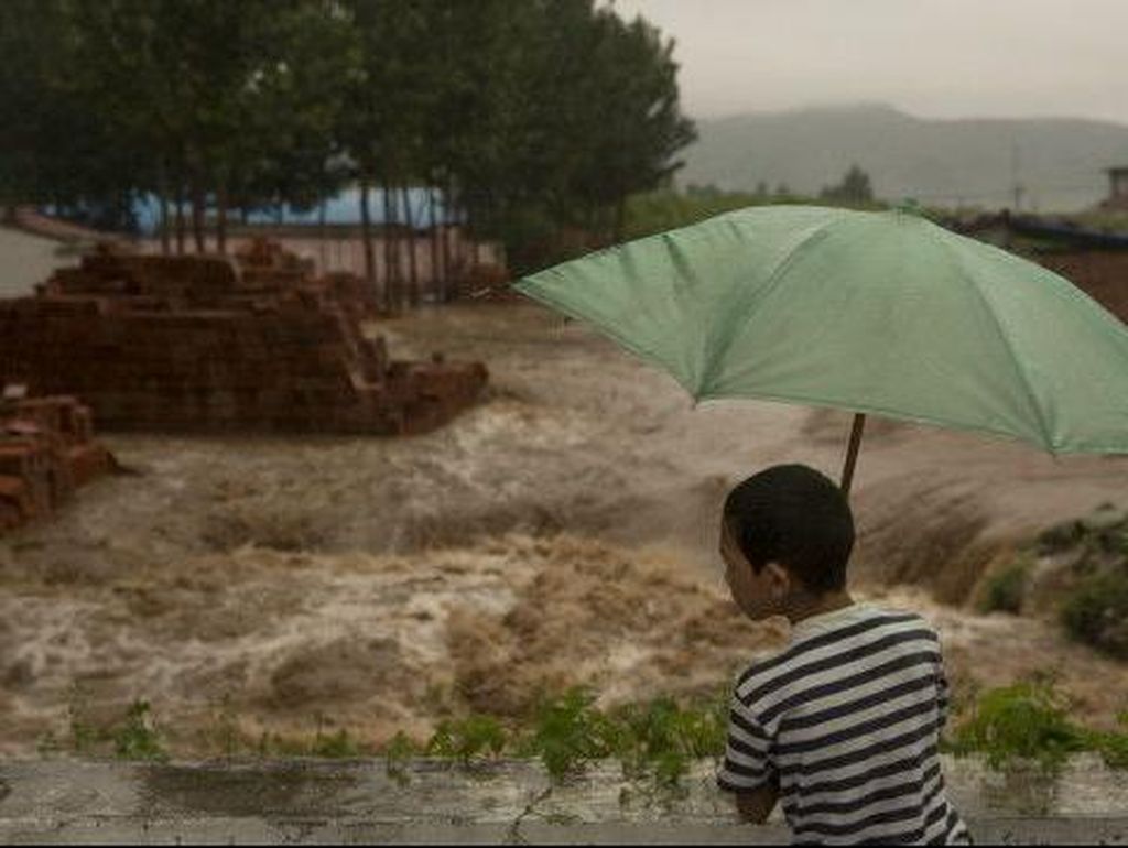 Banjir di China, Ribuan Rumah Hancur dan Sedikitnya 78 Orang Tewas Banjir di China, Ribuan Rumah Hancur dan Sedikitnya 78 Orang Tewas