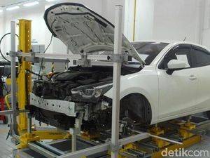 Perbaiki Bodi Mazda Kini Bisa di Cibubur