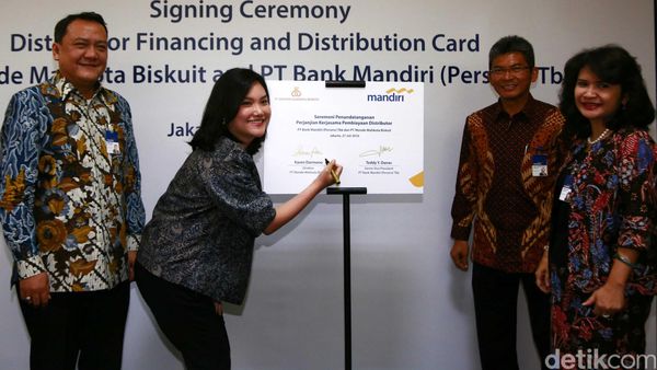 Perjanjian Kerja Sama Bank Mandiri dan Khong Guan Group