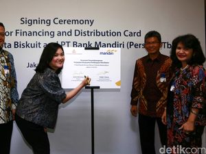 Perjanjian Kerja Sama Bank Mandiri dan Khong Guan Group