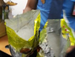 Simpan Sabu 2 Kg di Kaleng Roti, Seorang Pria Dibekuk di Bandara Kualanamu