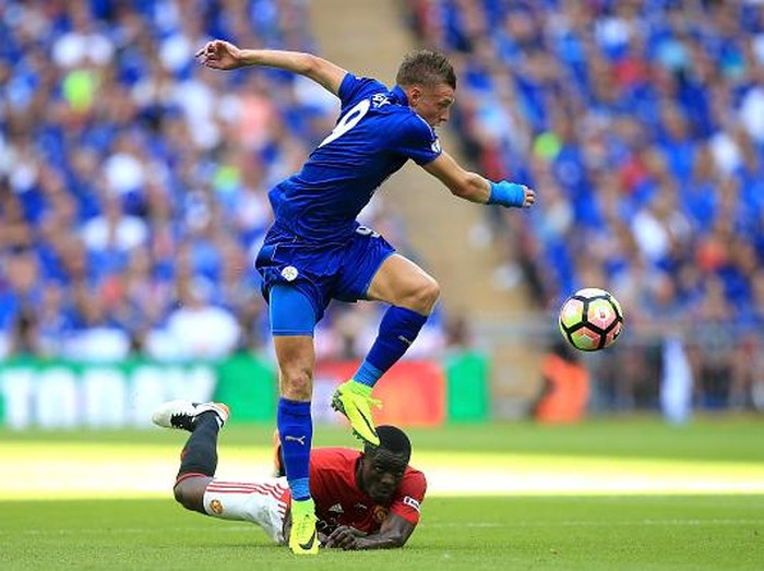 LONDON, ENGLAND - AUGUST 07:  Jamie Vardy of Leicester City jumps over Eric Bailly of Manchester United during The FA Community Shield match between Leicester City and Manchester United at Wembley Stadium on August 7, 2016 in London, England.  (Photo by Ben Hoskins/Getty Images)