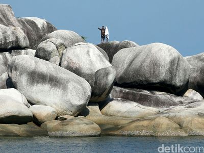 Menikmati Keindahan Pantai Tanjung Tinggi