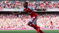 Theo Walcott merayakan gol yang dicetaknya di menit ke-31. Eddie Keogh/Reuters/detikFoto.