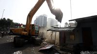Ekskavator Ratakan Bangunan di Rawajati