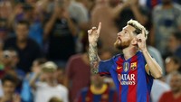 Lionel Messi merayakan gol. Dalam pertandingan ini, Messi tiga kali membobol gawang Celtic. Gol-gol itu dicetaknya di menit ke-3, 27, dan 60. Albert Gea/Reuters/detikFoto.