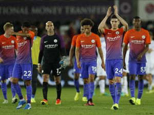 City Kalahkan Swansea